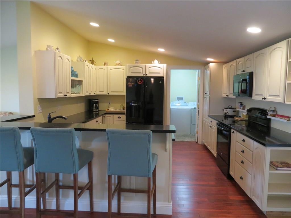 586 Anderson Hozak Road Clinton, PA 15026 - Photo 3 of 25 Gourmet Kitchen With Quartz Counter and Crme Cabinets with Laundry Area