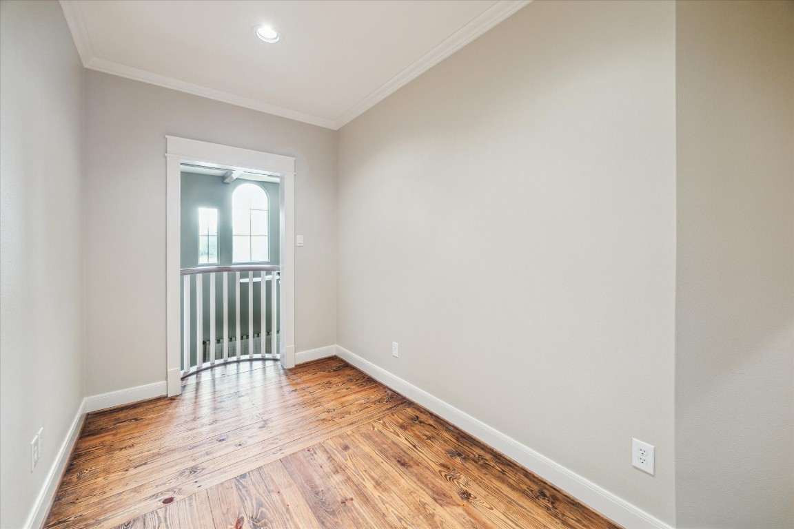 4511 Upper Oxbow Trace Fulshear, TX 77441 - Photo 23 of 40 a view of a room with wooden floor