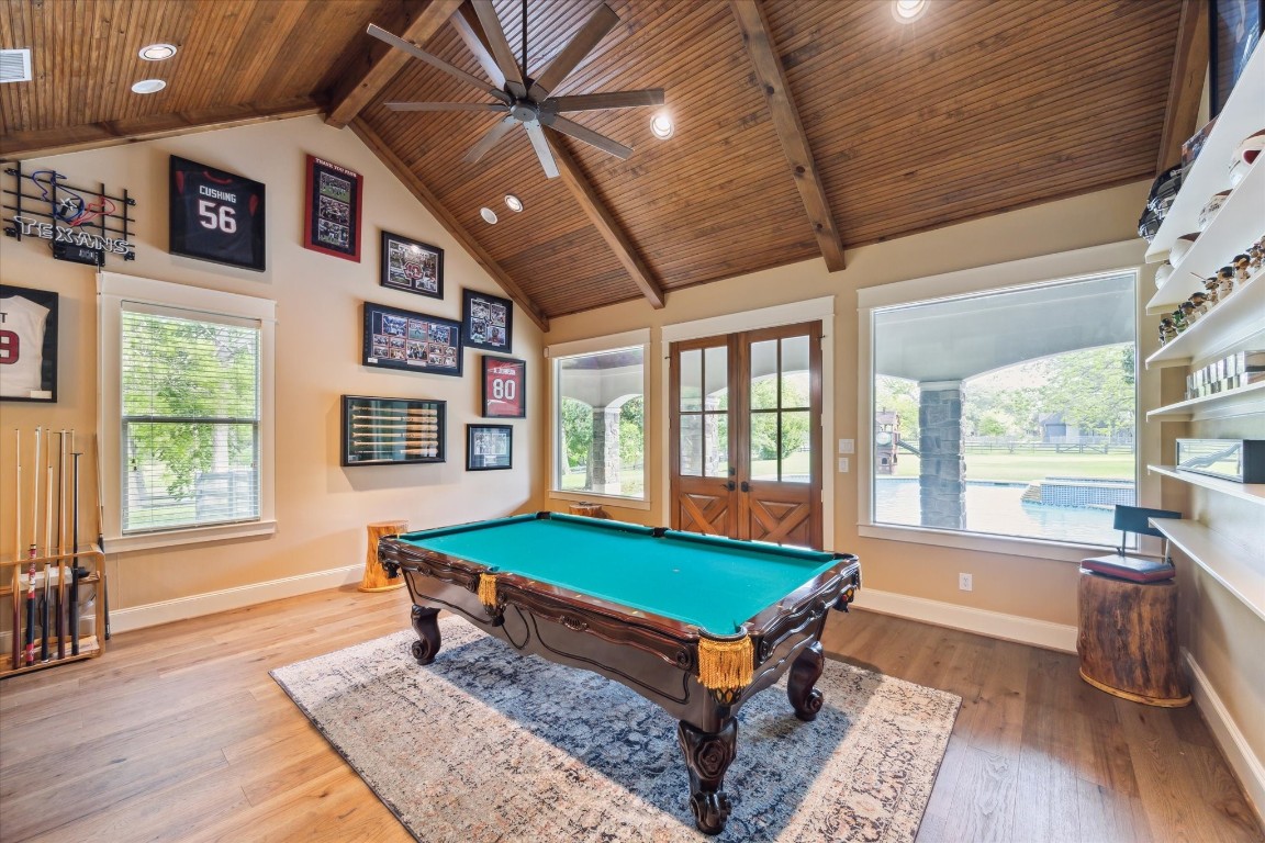 4511 Upper Oxbow Trace Fulshear, TX 77441 - Photo 28 of 40 a room with pool table and windows
