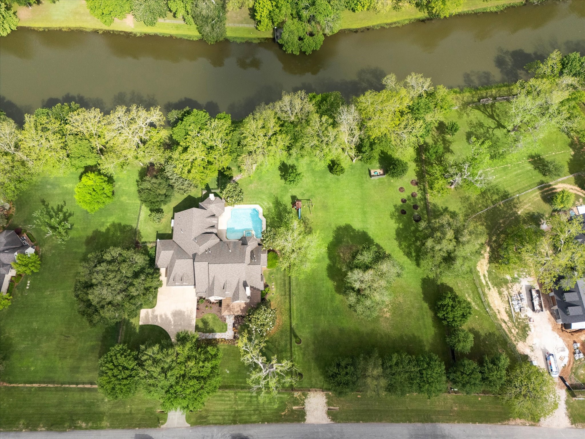 4511 Upper Oxbow Trace Fulshear, TX 77441 - Photo 3 of 40 an aerial view of a residential houses with lake view