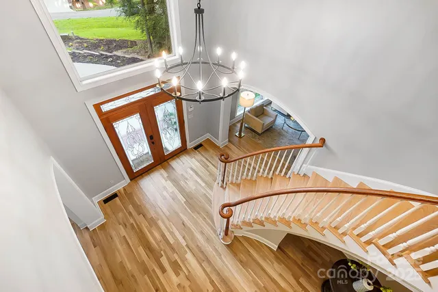 a bathroom with a toilet a sink and shower