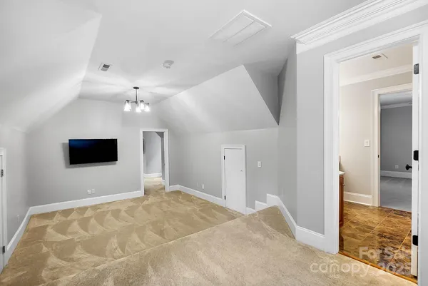 a view of a livingroom with a flat screen tv