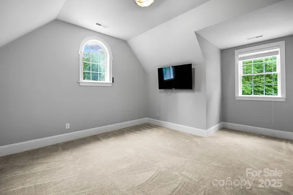 en empty room with windows