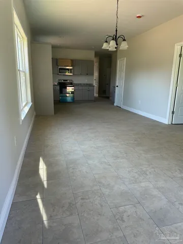 a view of a livingroom with furniture