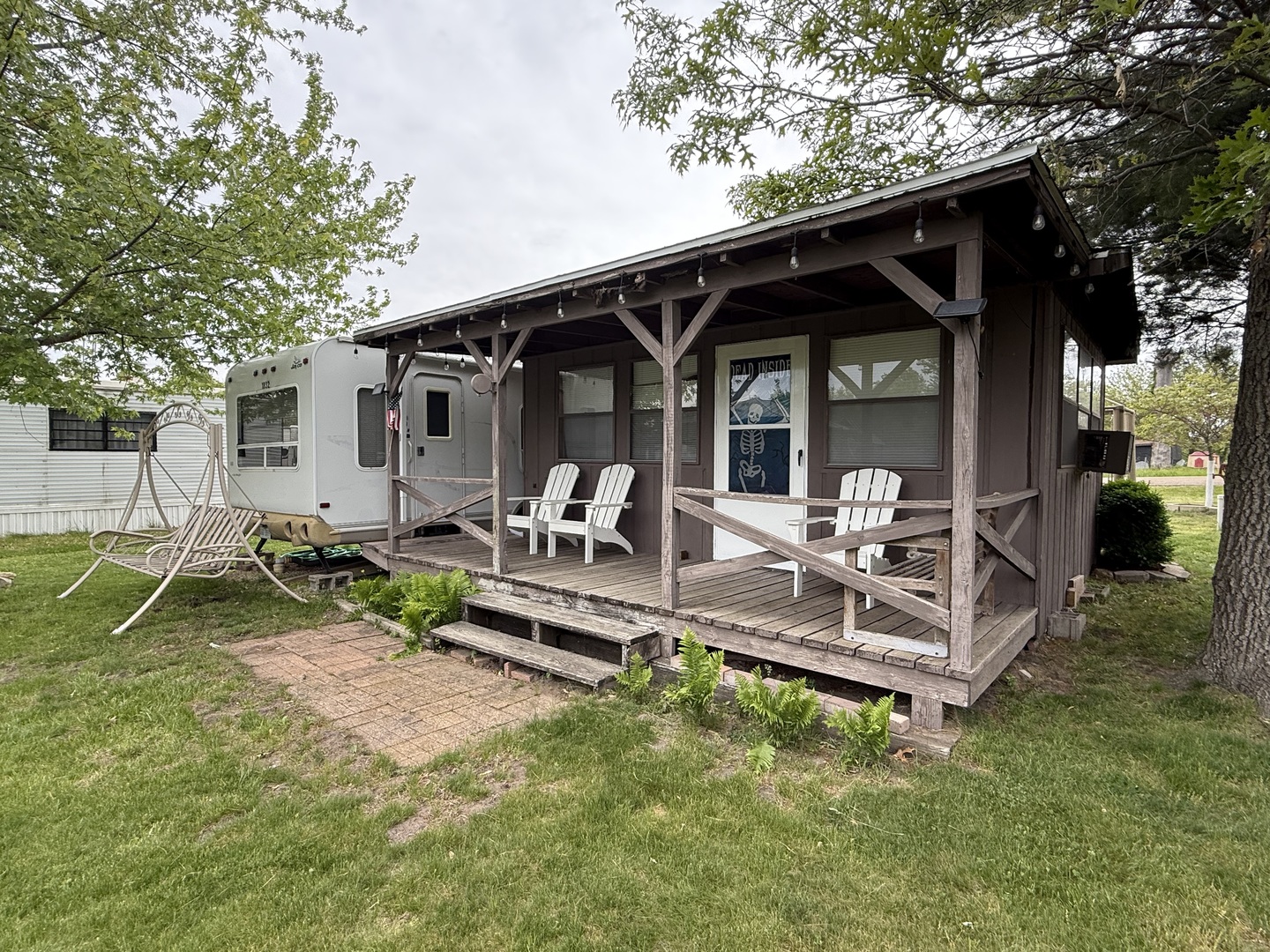 22-22 Woodhaven Lakes Sublette, IL 61367 - Photo 2 of 15 a view of a backyard with a patio