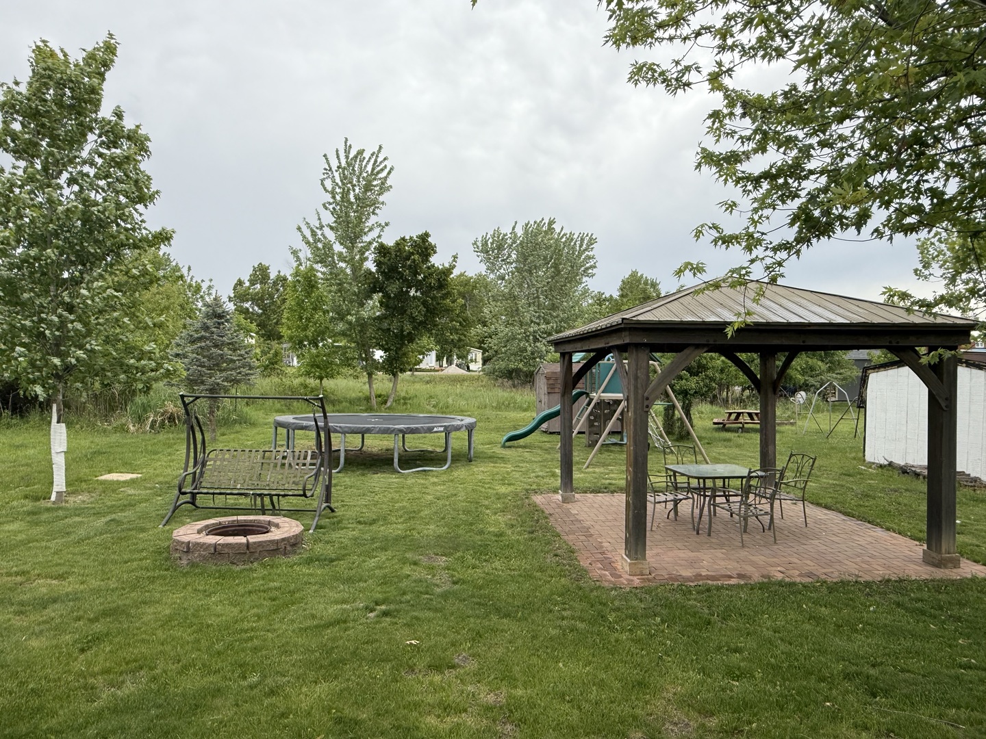 22-22 Woodhaven Lakes Sublette, IL 61367 - Photo 4 of 15 a view of a park with large trees