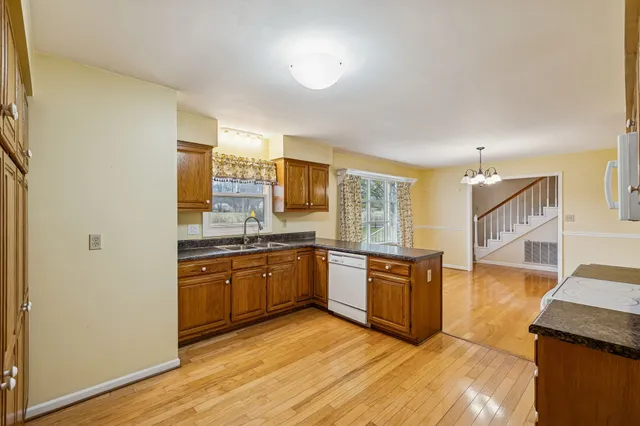 a view of a bathroom from a hallway