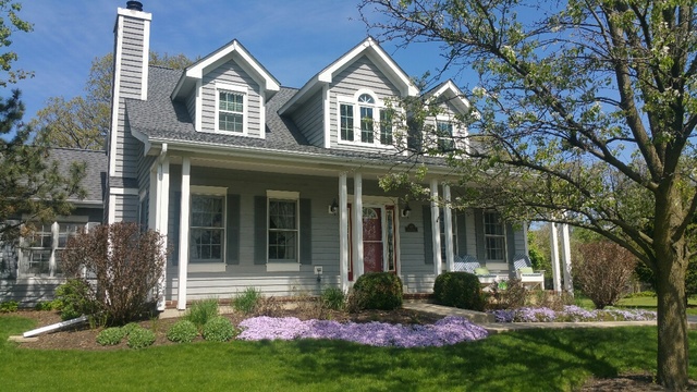 407 Hankes Road Sugar Grove, IL 60554 - Photo 1 of 40 front view of a house with a yard