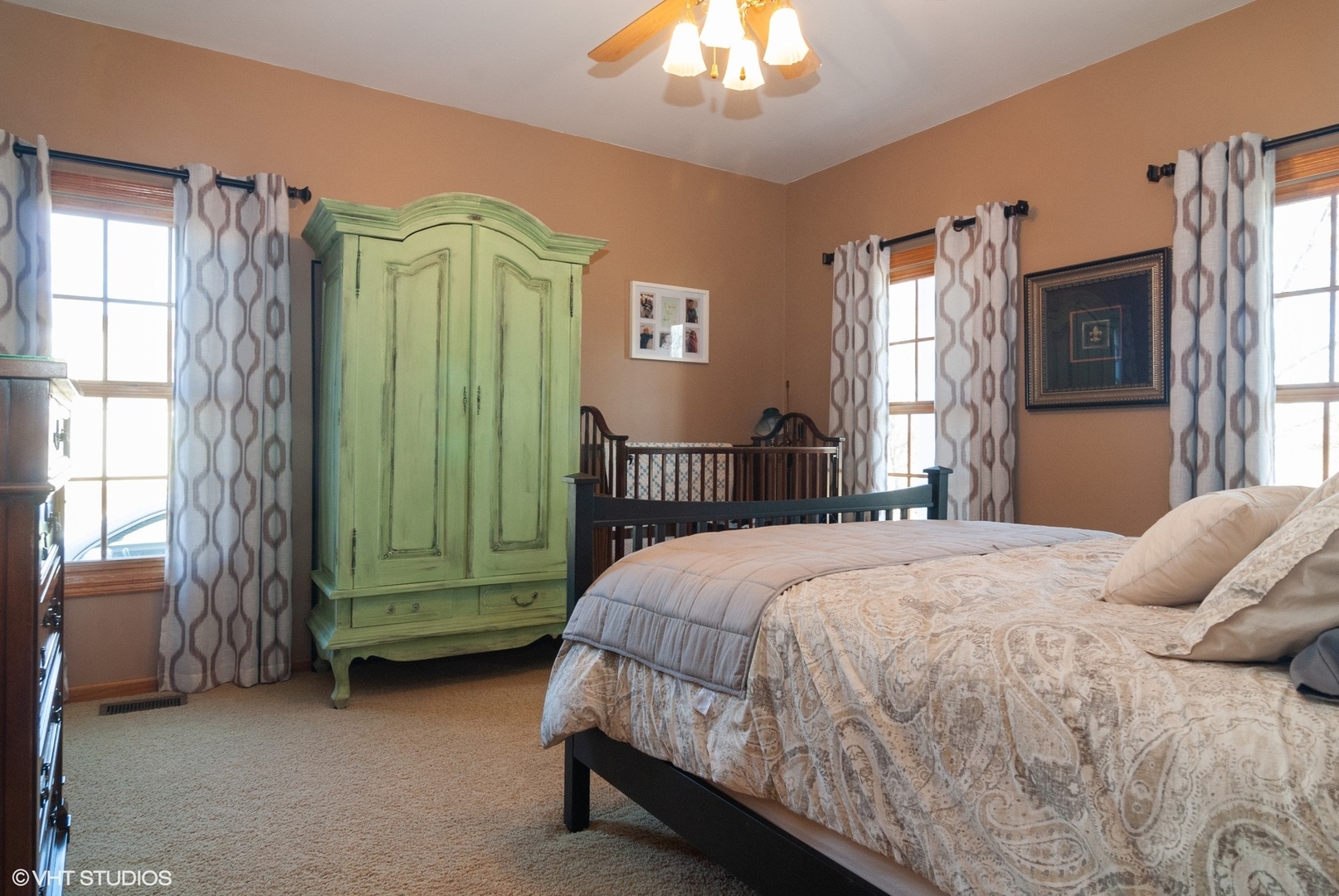 407 Hankes Road Sugar Grove, IL 60554 - Photo 17 of 40 a bedroom with a bed and a chandelier