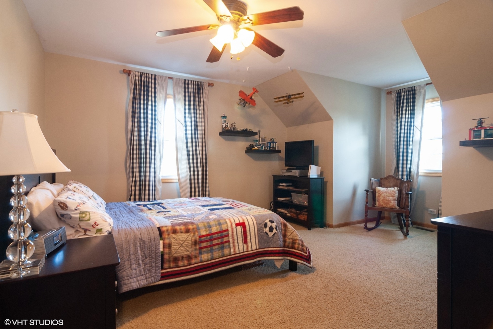 407 Hankes Road Sugar Grove, IL 60554 - Photo 19 of 40 a bedroom with a bed and a chandelier