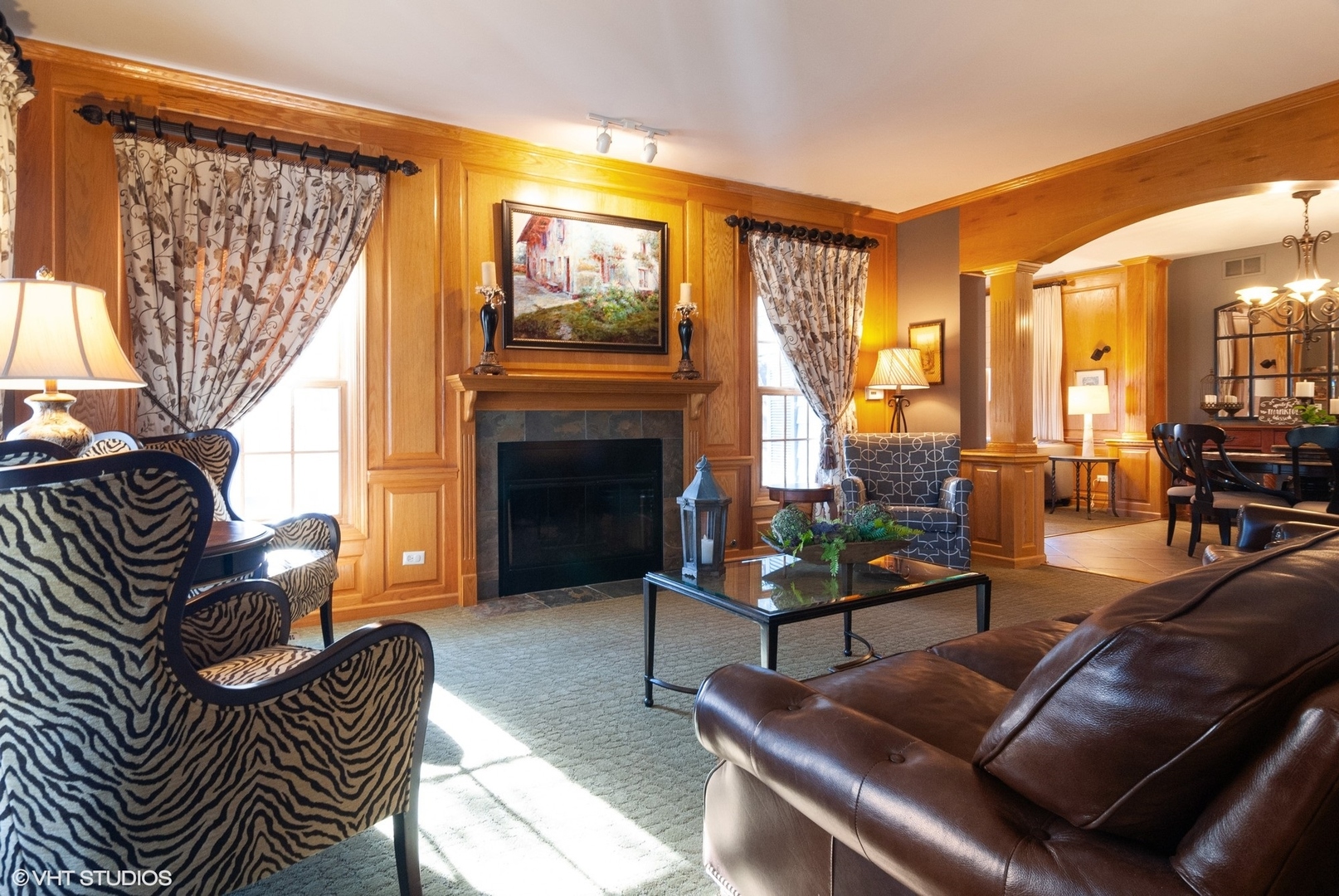 407 Hankes Road Sugar Grove, IL 60554 - Photo 3 of 40 a living room with furniture a fireplace and a large window