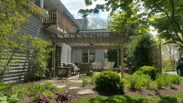 407 Hankes Road Sugar Grove, IL 60554 - Photo 37 of 40 a view of house with a yard and potted plants