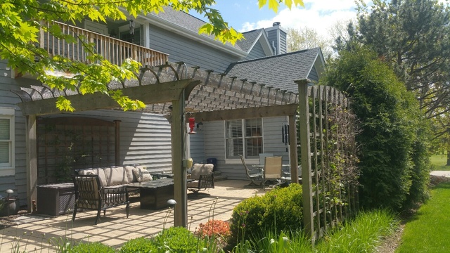 407 Hankes Road Sugar Grove, IL 60554 - Photo 38 of 40 a view of a chair and table in backyard