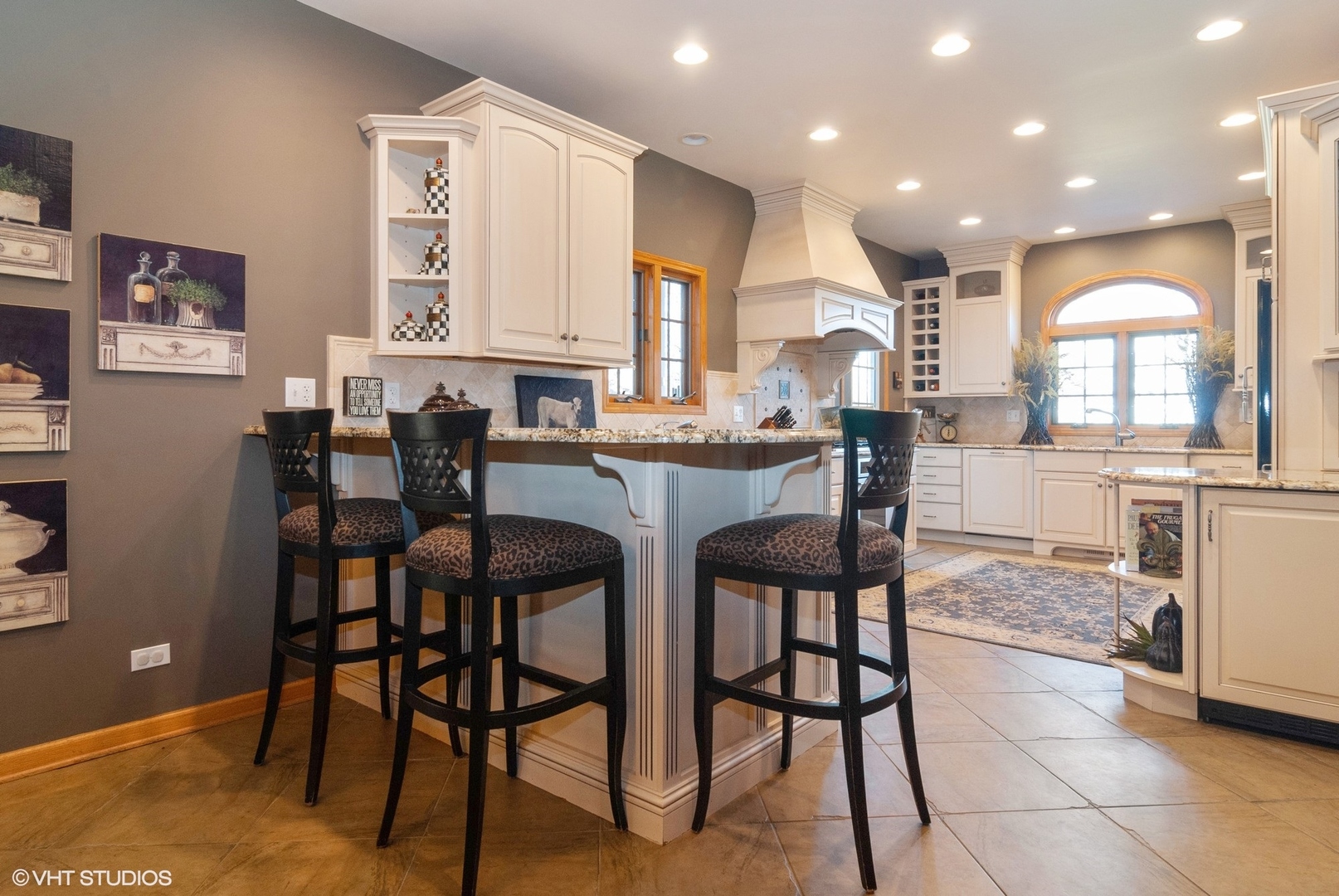 407 Hankes Road Sugar Grove, IL 60554 - Photo 7 of 40 a kitchen with stainless steel appliances kitchen island granite countertop a refrigerator a stove a dining table and chairs
