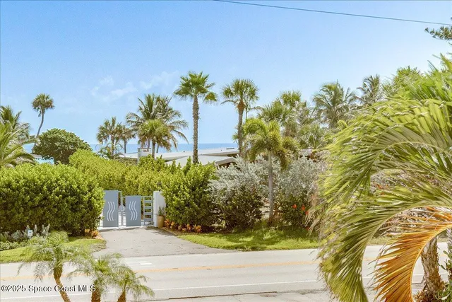 swimming pool view with a seating space