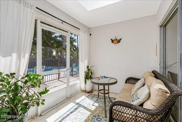 a kitchen with stainless steel appliances a stove microwave and sink