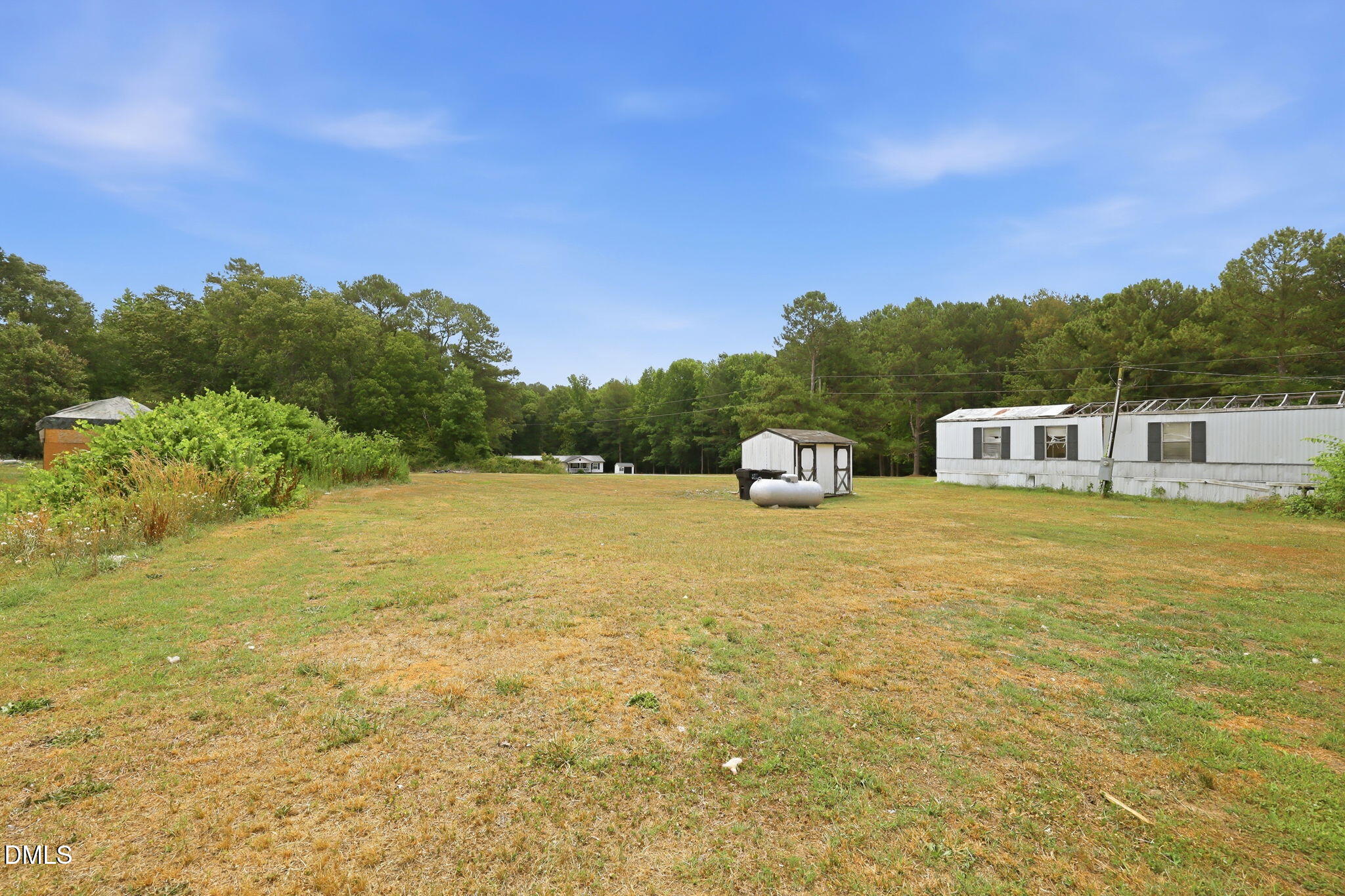 1758 Barber Mill Road Clayton, NC 27520 - Photo 31 of 41 a house view with a lake view