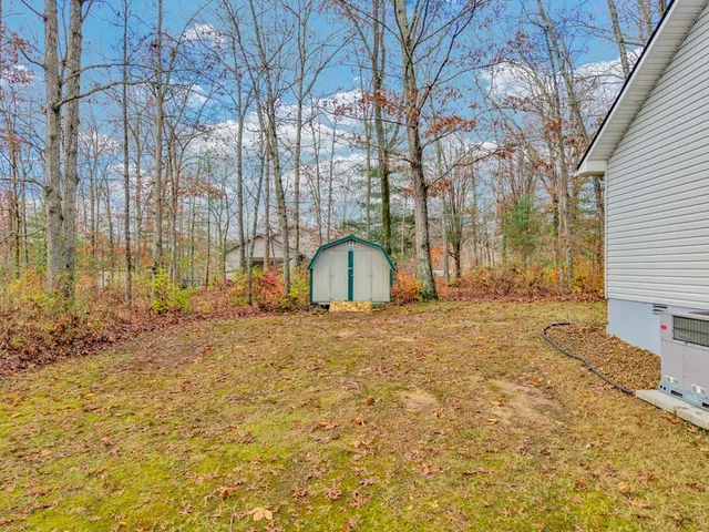 a house with trees in front of it