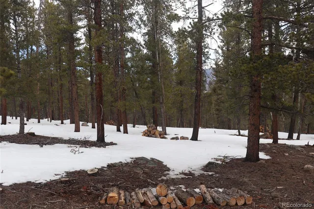 a view of snow on the side of a road