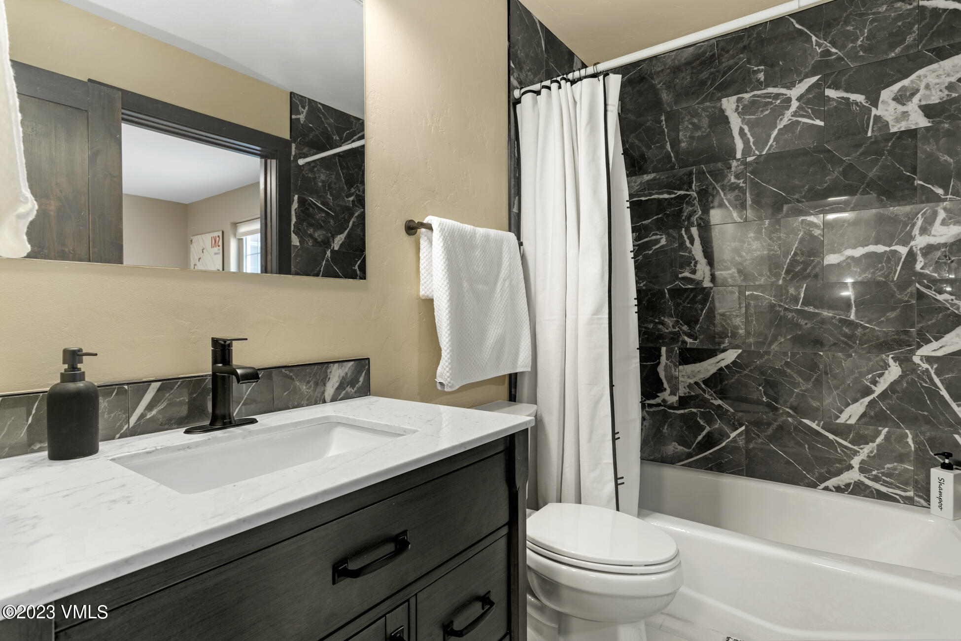 160 Nottingham Road, Unit 1 Avon, CO 81620 - Photo 16 of 28 a bathroom with a sink a toilet and shower