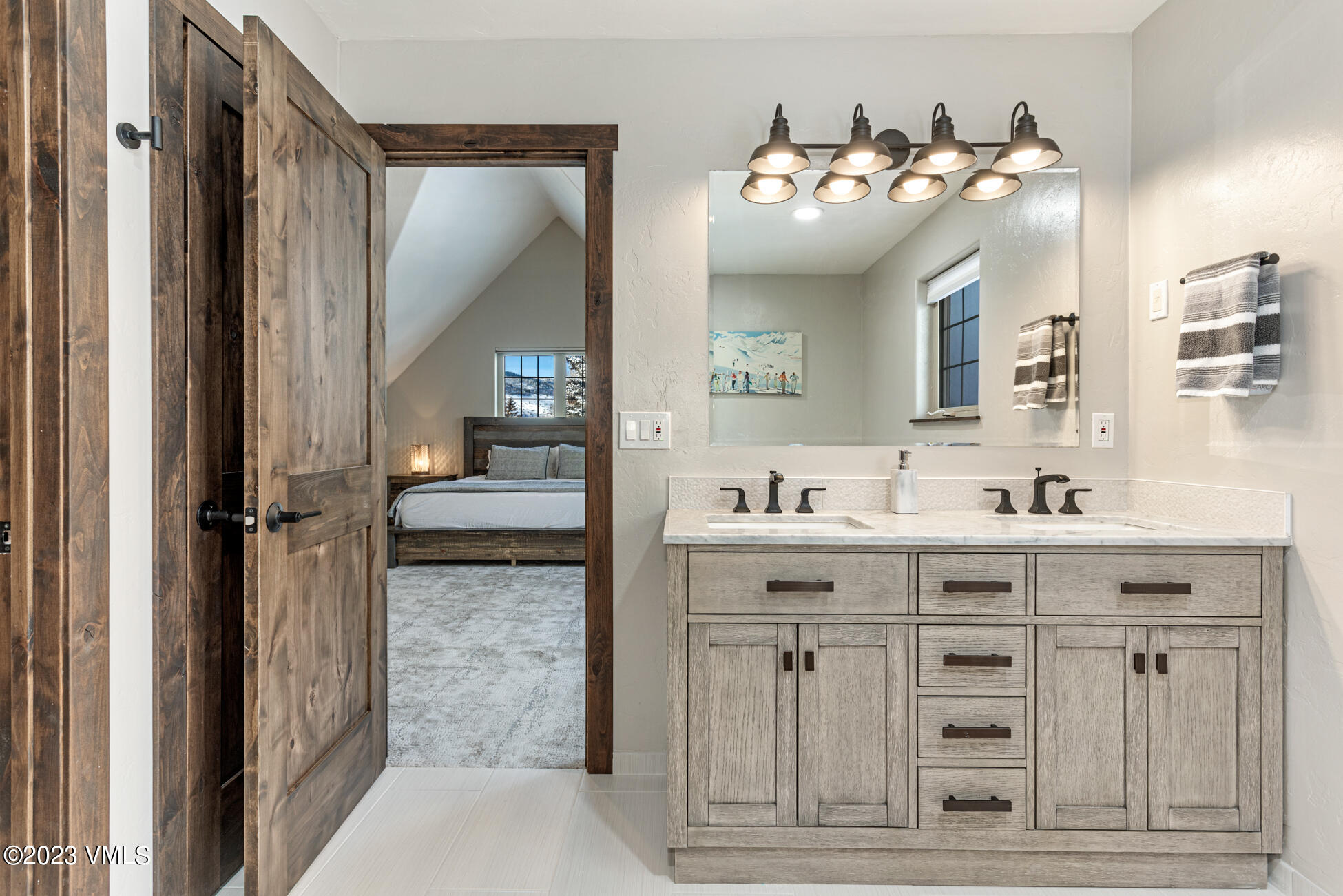 160 Nottingham Road, Unit 1 Avon, CO 81620 - Photo 20 of 28 a bathroom with a double vanity sink and mirror