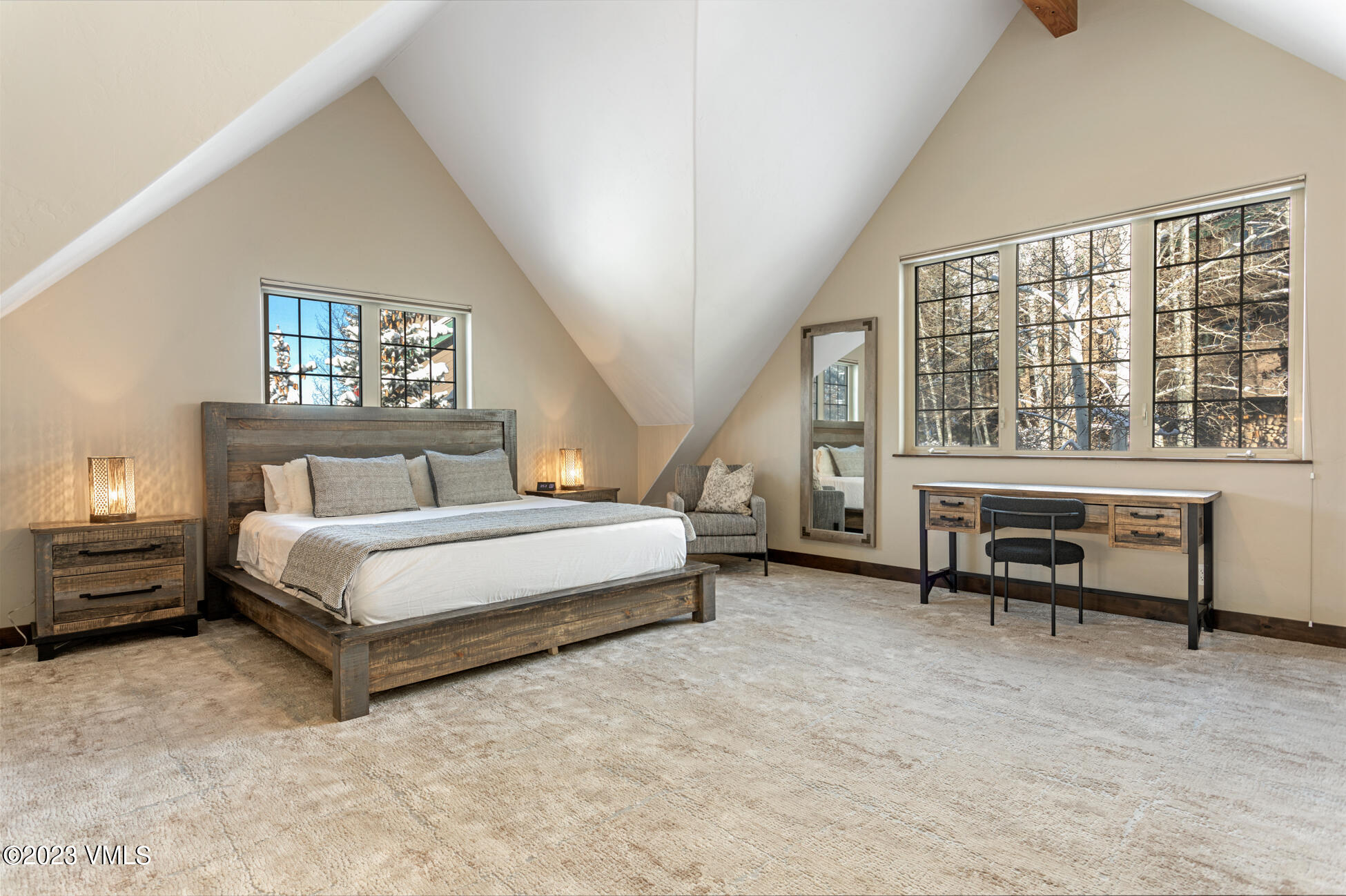 160 Nottingham Road, Unit 1 Avon, CO 81620 - Photo 21 of 28 a bedroom with a bed and a large window