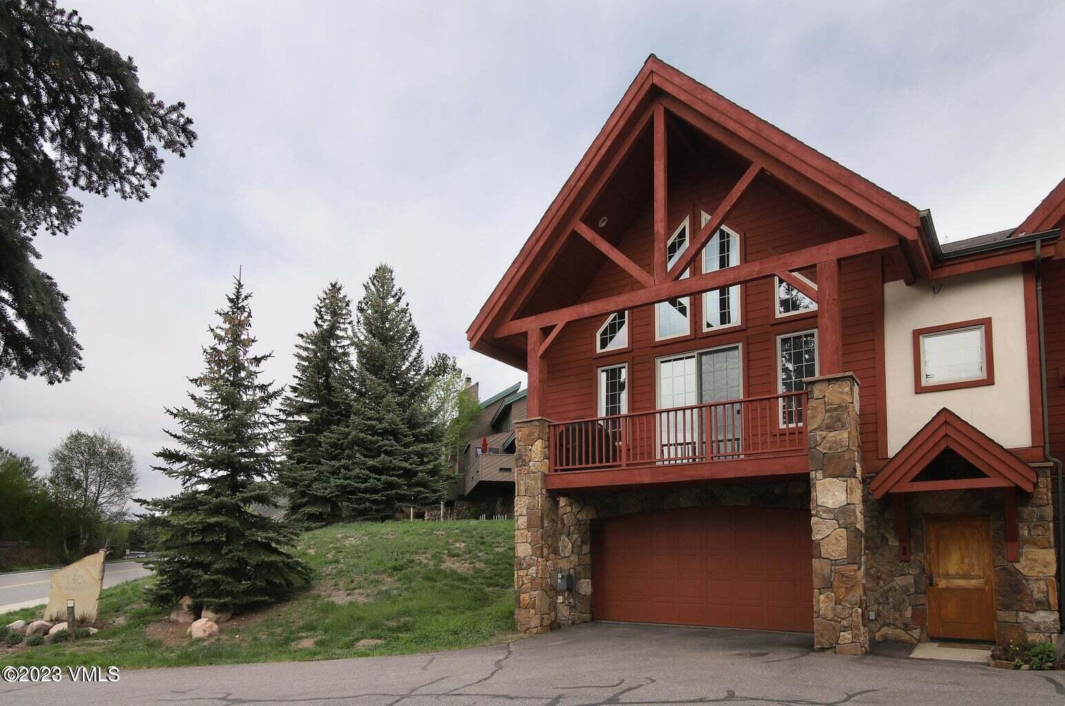 160 Nottingham Road, Unit 1 Avon, CO 81620 - Photo 28 of 28 a front view of a house with a yard