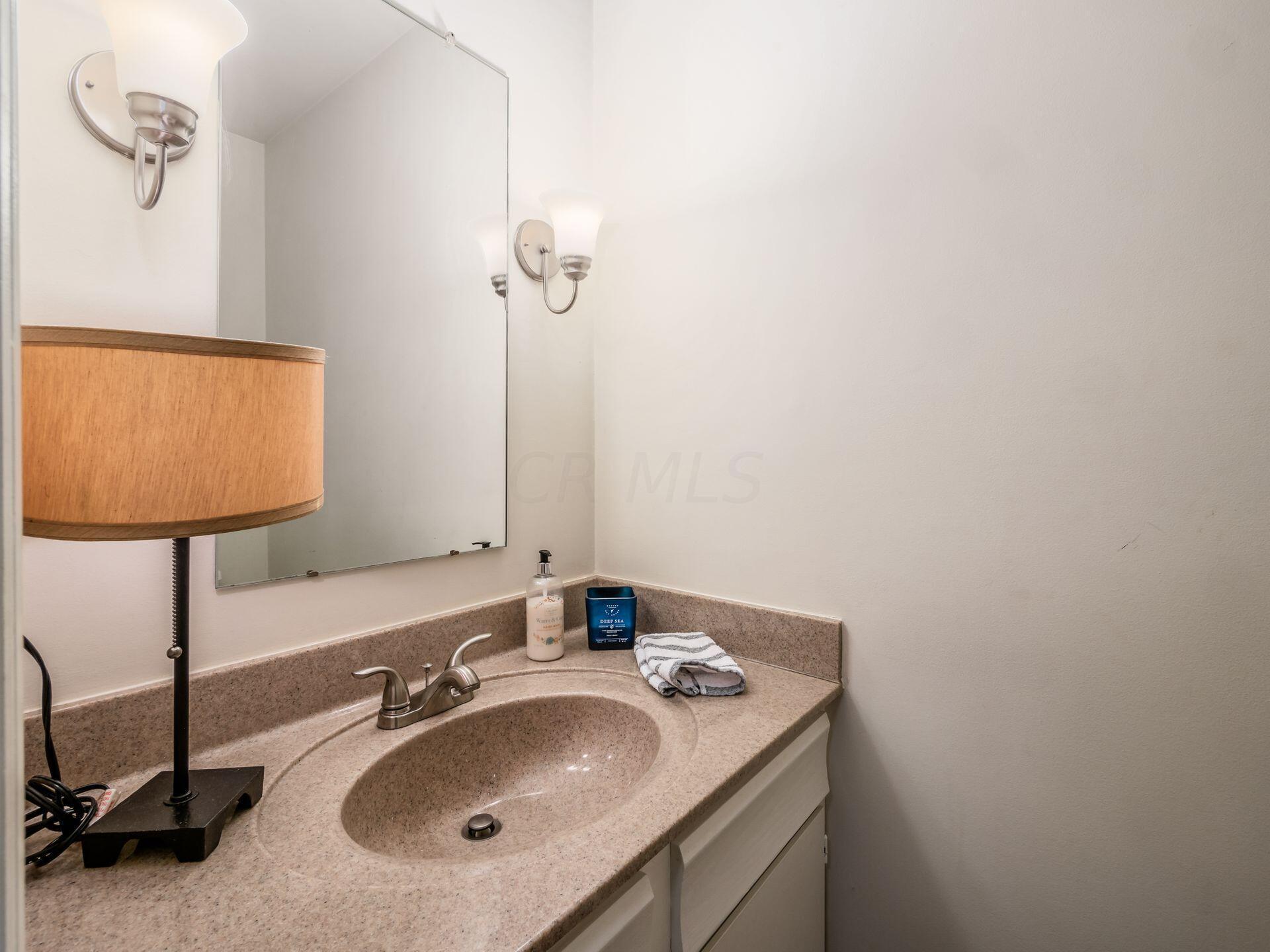 2711 Folkstone Road Columbus, OH 43220 - Photo 45 of 62 Half Bath, hardwood floor