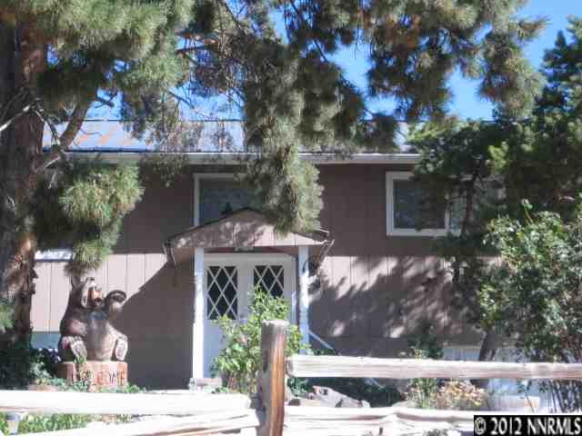 85 Redstone Drive Reno, NV 89512 - Photo 1 of 1 a front view of a house with garden