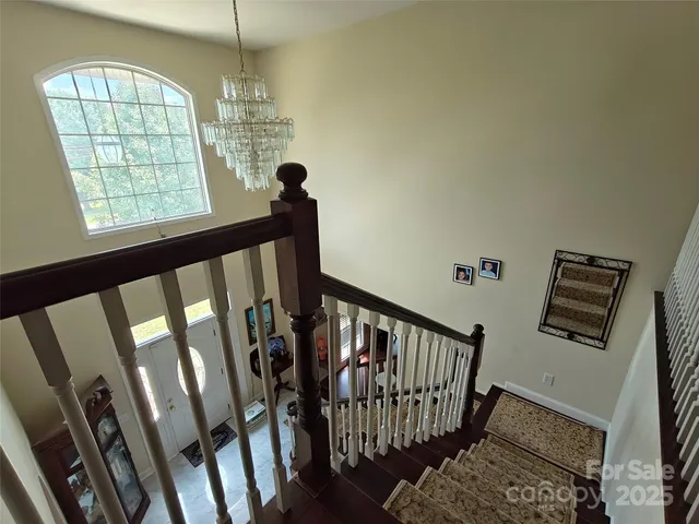 a view of entryway with a window and furniture