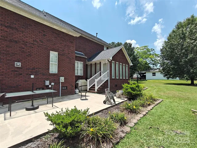 a house view with a garden space