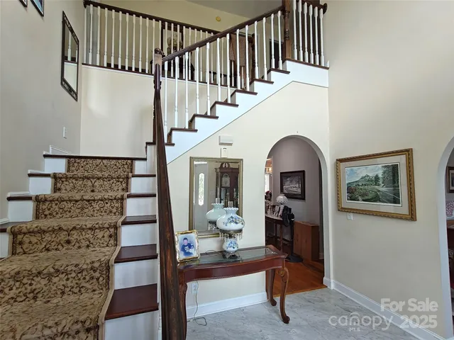 a view of entryway with wooden floor