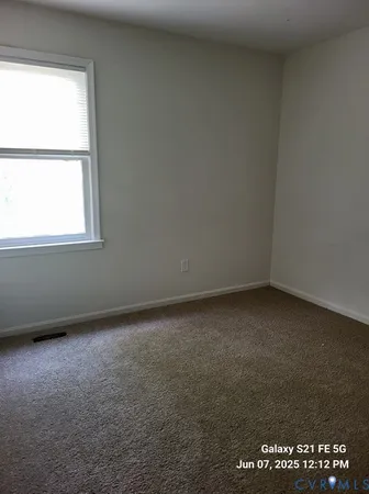 an empty room with a window