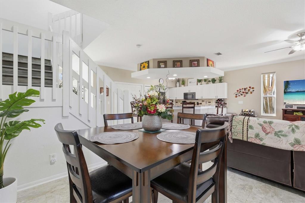 3221 Meta Court Largo, FL 33771 - Photo 11 of 40 a view of a dining room with furniture and window
