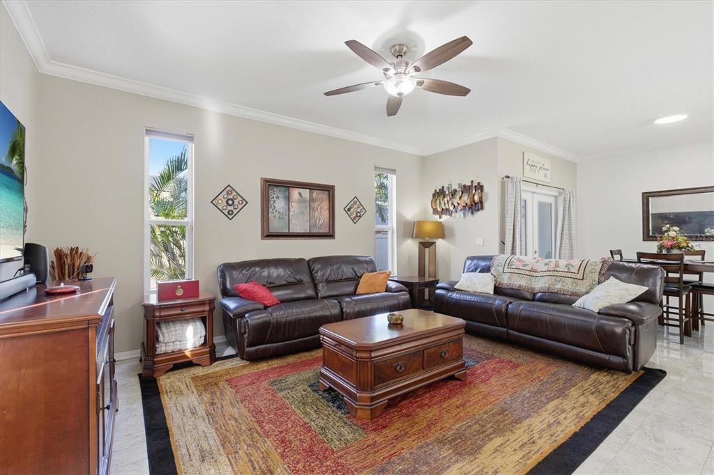 3221 Meta Court Largo, FL 33771 - Photo 13 of 40 a living room with furniture a rug and a window