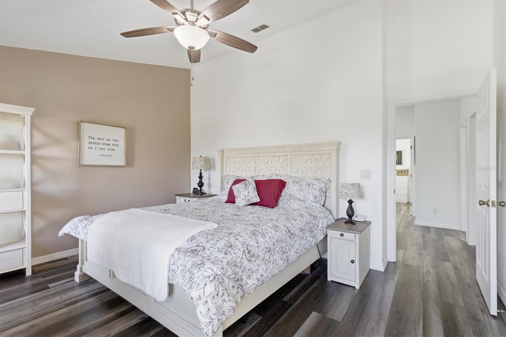 3221 Meta Court Largo, FL 33771 - Photo 20 of 40 a bedroom with a bed and a dresser