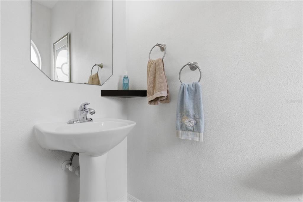 3221 Meta Court Largo, FL 33771 - Photo 29 of 40 a bathroom with a sink and a mirror