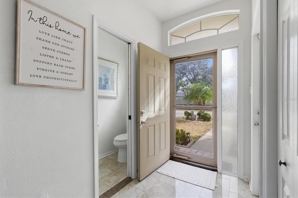 3221 Meta Court Largo, FL 33771 - Photo 5 of 40 a view of a bathroom with tub and shower