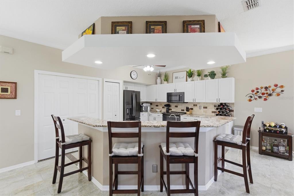 3221 Meta Court Largo, FL 33771 - Photo 8 of 40 a view of a dining room with furniture