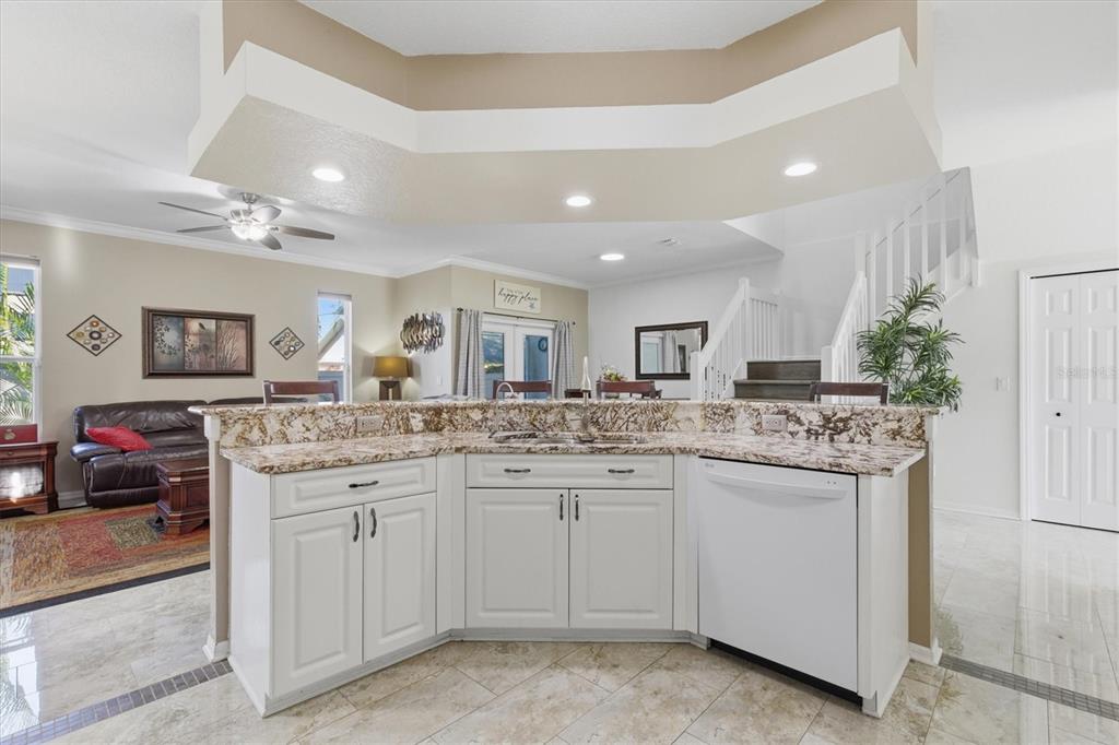 3221 Meta Court Largo, FL 33771 - Photo 9 of 40 a kitchen with a sink and cabinets