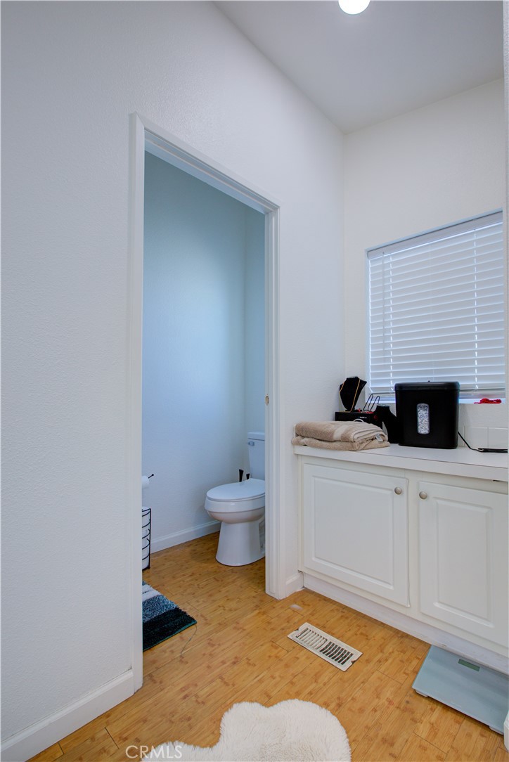 6450 North Winton Way, Unit 76 Winton, CA 95388 - Photo 13 of 38 a spacious bathroom with a toilet sink and mirror