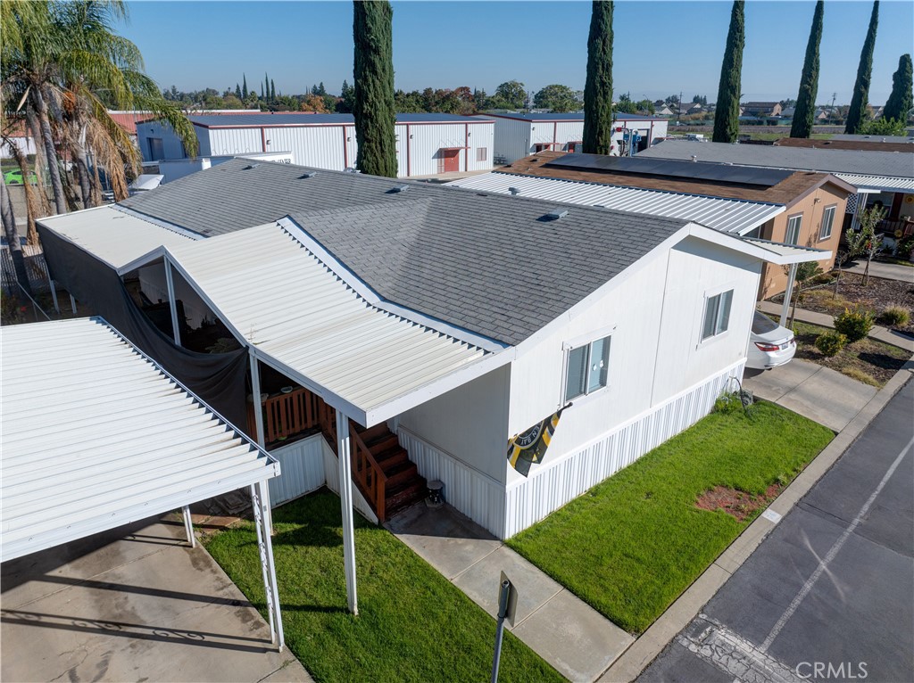 6450 North Winton Way, Unit 76 Winton, CA 95388 - Photo 30 of 38 an aerial view of a house with a yard