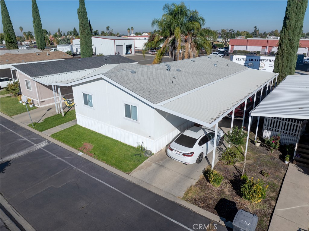 6450 North Winton Way, Unit 76 Winton, CA 95388 - Photo 31 of 38 an aerial view of a house with a yard