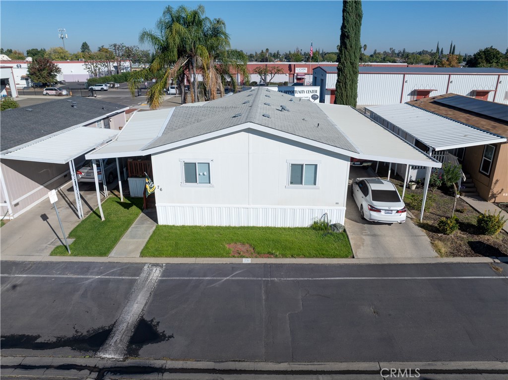 6450 North Winton Way, Unit 76 Winton, CA 95388 - Photo 33 of 38 an aerial view of a house with garden space and street view