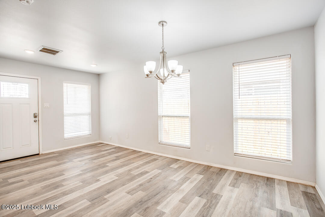 5514 Jarvis Street Lubbock, TX 79416 - Photo 4 of 16 a view of a room with windows