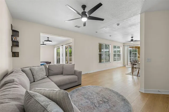 a living room with furniture and a window