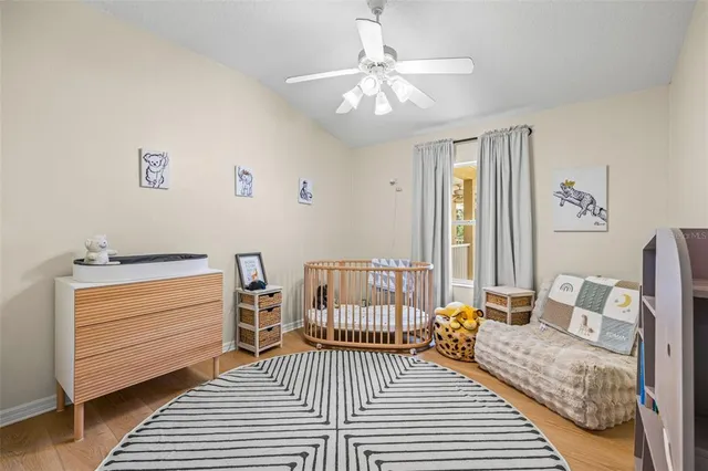a view of a hallway with closet and cabinet