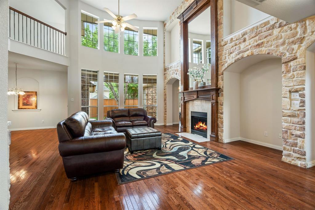 2012 Burnside Drive Allen, TX 75013 - Photo 11 of 40 a living room with furniture and a fireplace