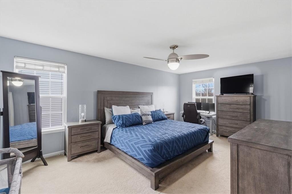 235 Long Ridge Drive Coraopolis, PA 15108 - Photo 16 of 36 a bedroom with a bed and a flat screen tv