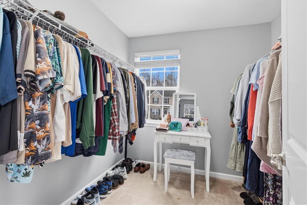 235 Long Ridge Drive Coraopolis, PA 15108 - Photo 20 of 36 a view of walk in closet with clothes and shoes